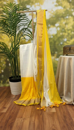 Surya Rekha-Yellow & White Mul Cotton saree with zari border tassels