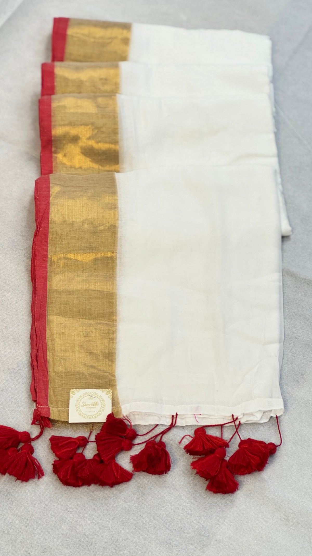 Golden Scarlet - White Mul Cotton Saree with Red Border, Zari Stripe and Tassels
